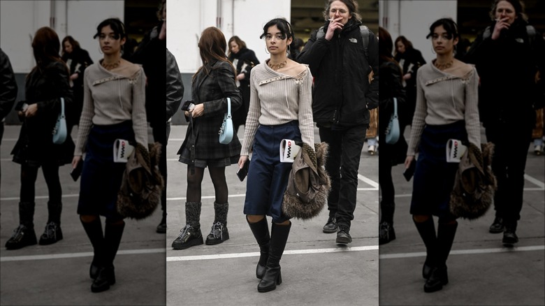 woman wearing bermuda shorts and boots