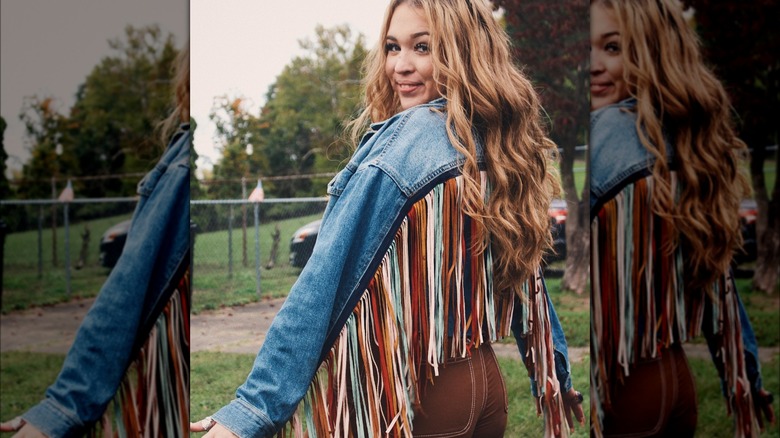 Girl wearing a fringe jacket