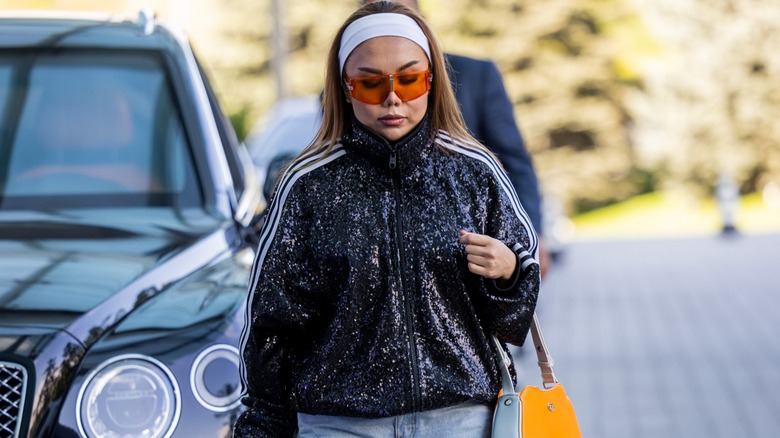 woman wearing sequined jacket