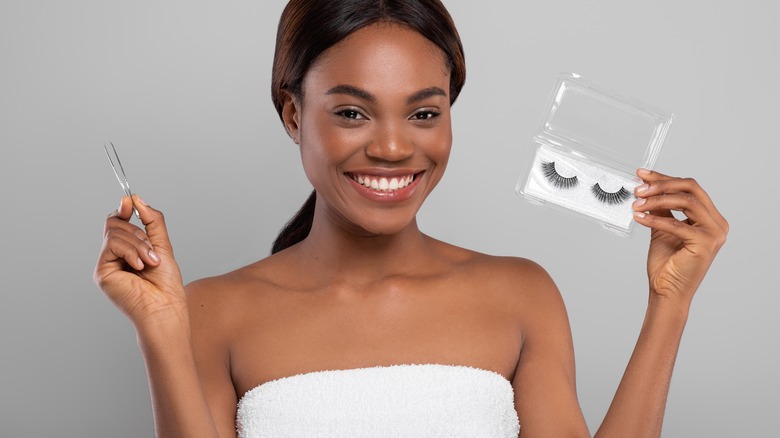 woman smiling with fake lashes
