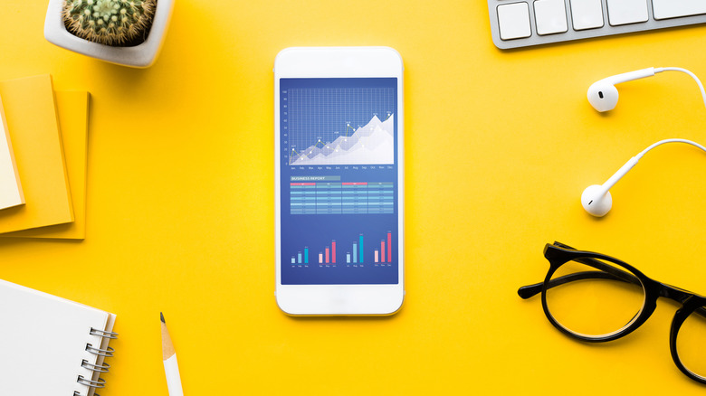 Smartphone with graphs on screen