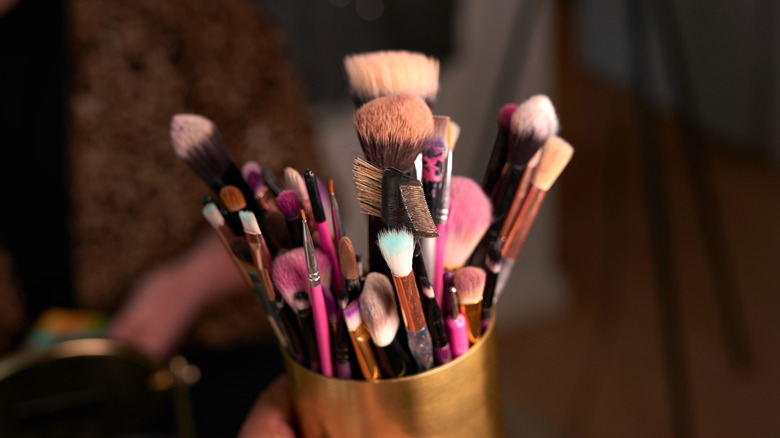 Makeup brushes in jar