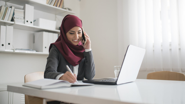 Woman working at her office