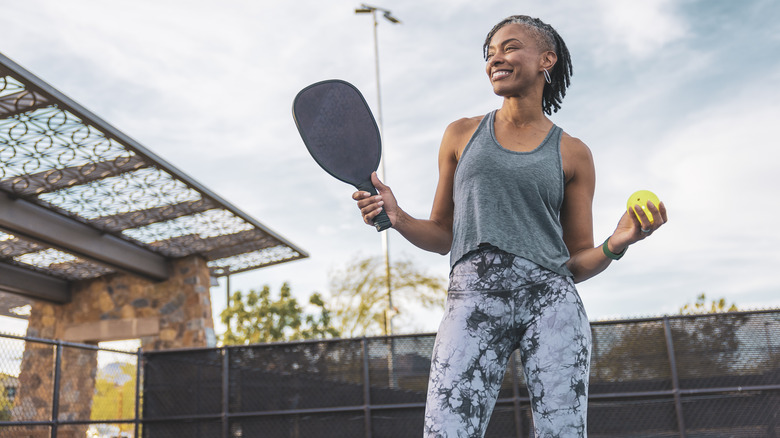 Woman playing pickleball