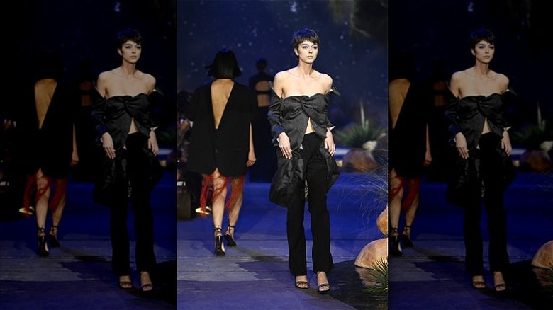 model wearing deconstructed blazer