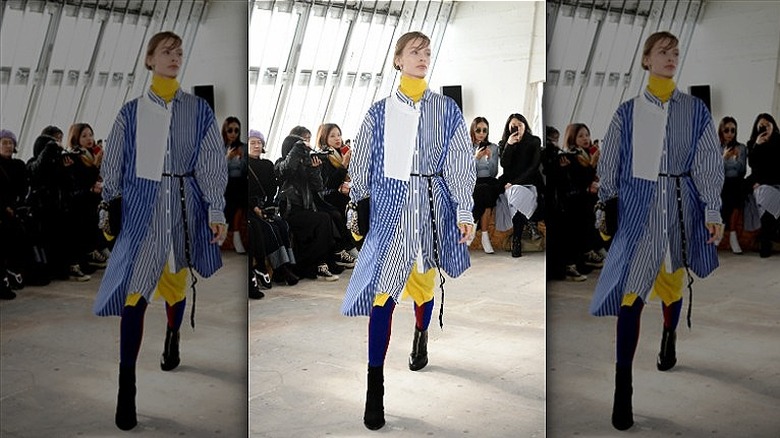 model wearing deconstructed shirt dress