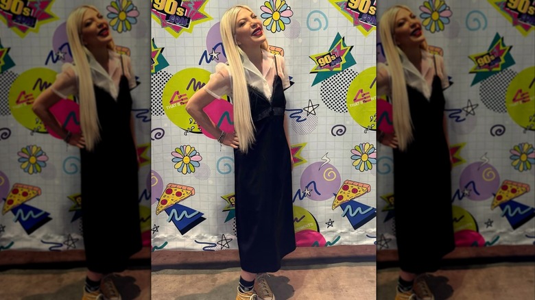 Tori Spelling smiling after she got veneers