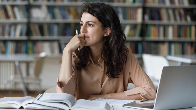 Distracted woman at the library