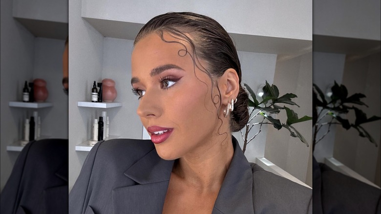 woman with Slicked back bun 