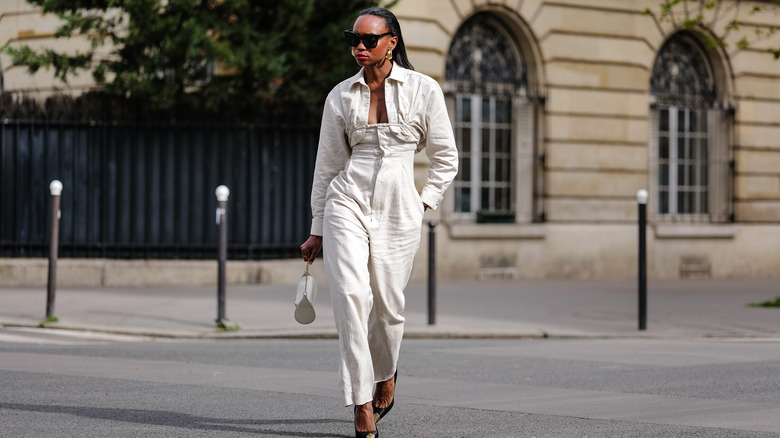 woman wearing cinched jumpsuit