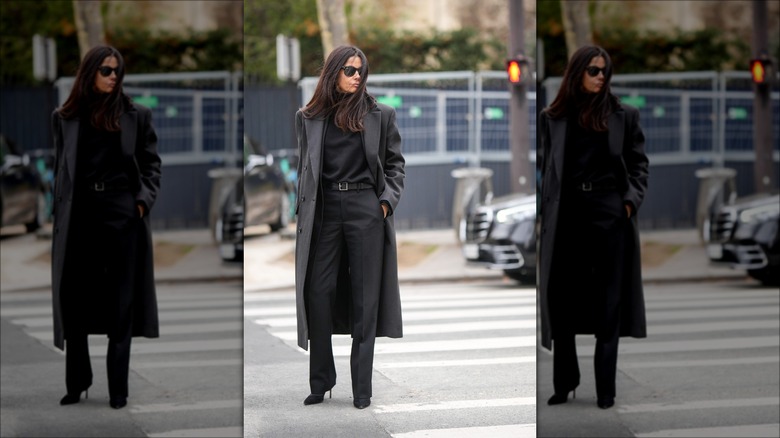 woman wearing pleated trousers