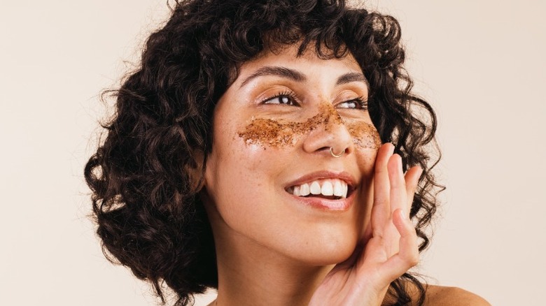 A woman applying a peel