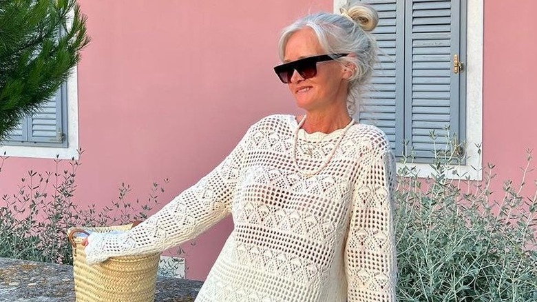 Silver hair in a bun