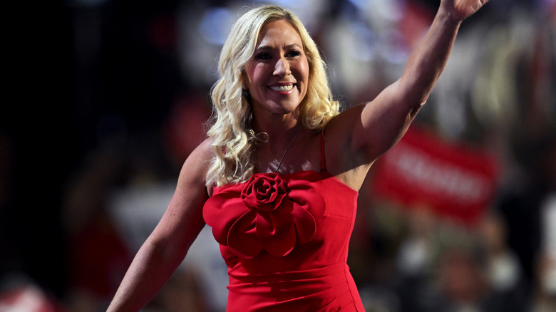 Marjorie Taylor Greene in a red flower dress