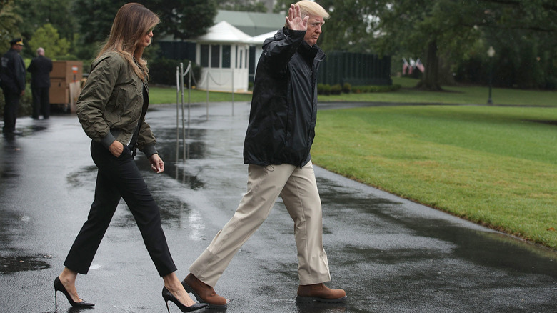 Melania Trump wearing stilettos next to Donald Trump at the White House