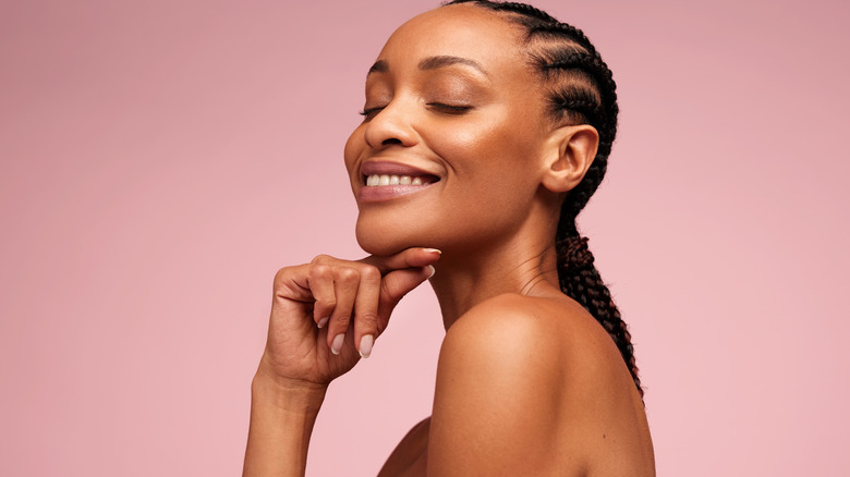 Smiling woman with glowing skin