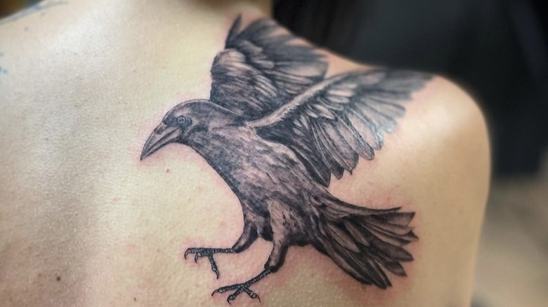 crow tattoo on shoulder