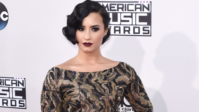 Demi Lovato in gown, vamp makeup p