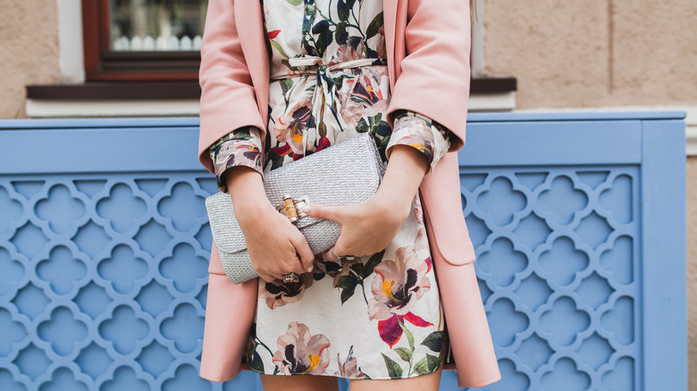 white dress with pink coat