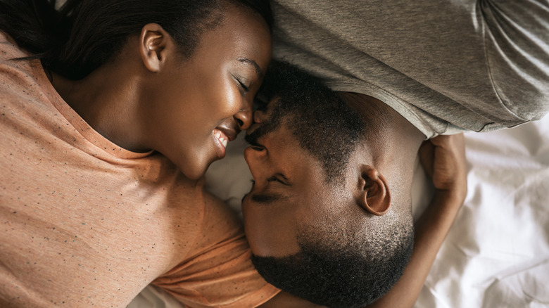 Man and woman in bed