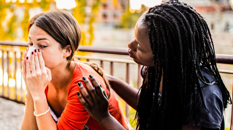 woman showing compassion to friend