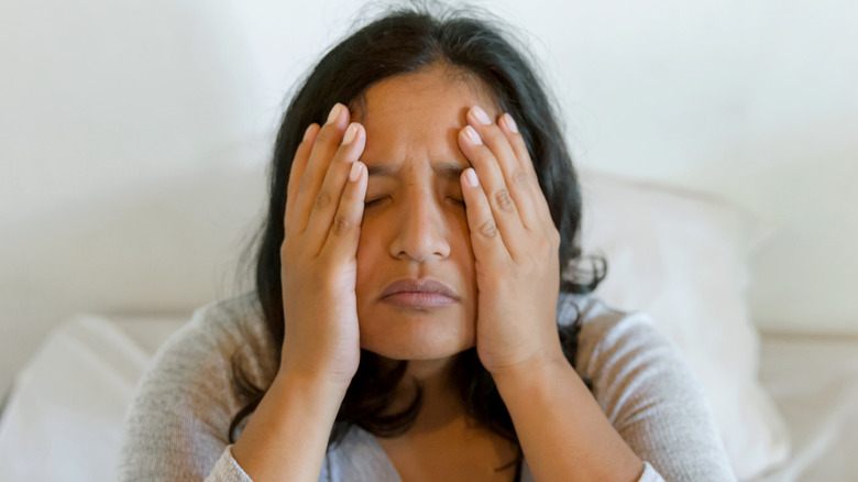 woman feeling overwhelmed