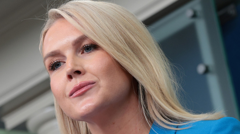 Close up of Karoline Leavitt's face showing several Mar-a-Lago face features