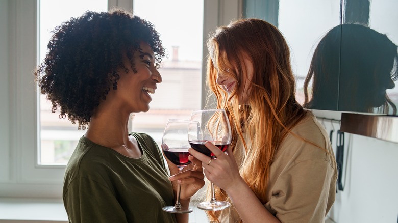 Couple sharing glass of wine