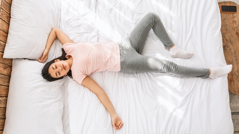 woman laying on back