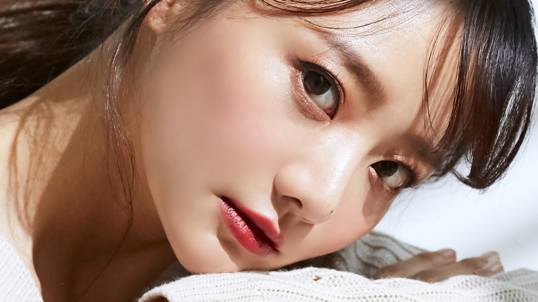 Asian female with dewy makeup