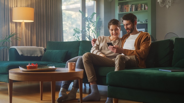 couple looking at phone