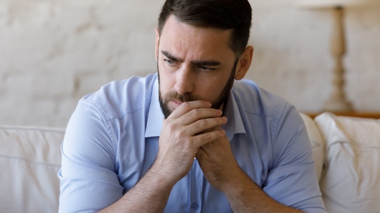 Man looking insecure