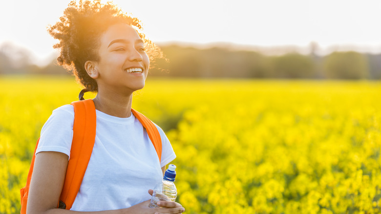 Woman smiling on a hike