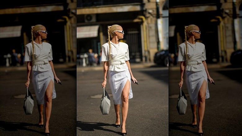 woman wearing white top and midi 