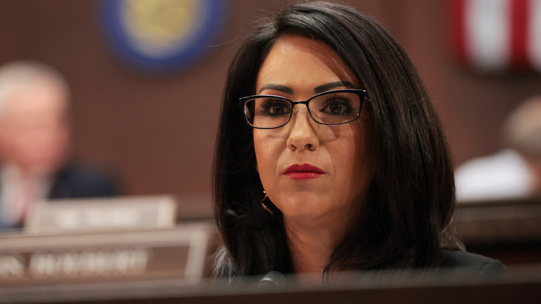 Lauren Boebert sits in a committee meeting
