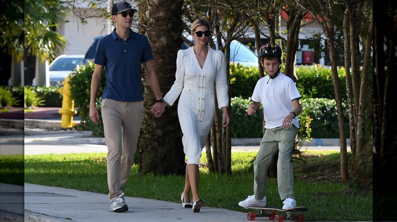 Ivanka Trump wearing a vintage-looking dress on a walk.
