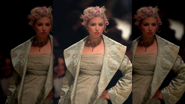 Ivanka Trump with pink dye in her hair and a green outfit