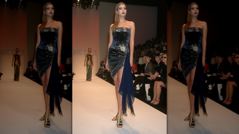 Ivanka Trump wearing a metallic strapless mini with a navy sash and gold shoes