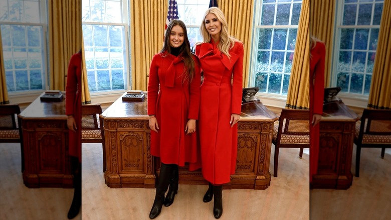 Ivanka Trump wearing a matching red coat with daughter Arabella