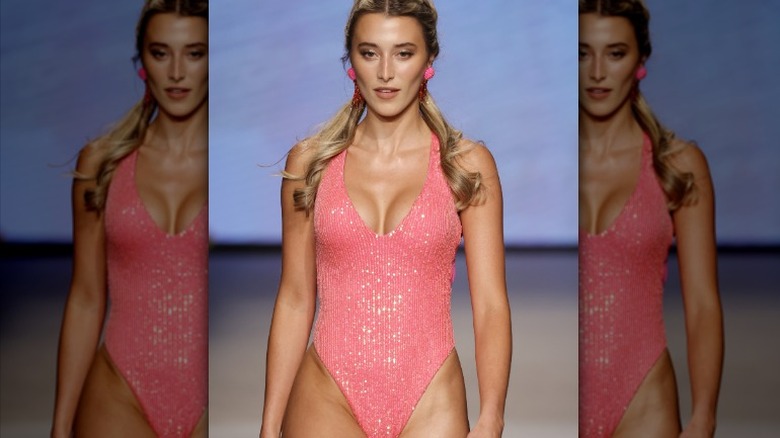 woman wearing bedazzled swimsuit