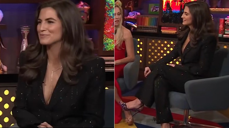 Kaitlan Collins' wearing a glittery blazer with a deep plunge on "Watch What Happens Live with Andy Cohen"