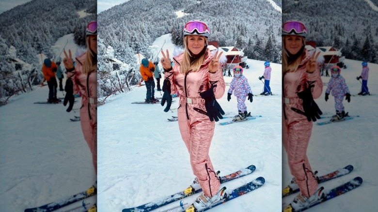 Karoline Leavitt flashes peace signs while on the ski slopes