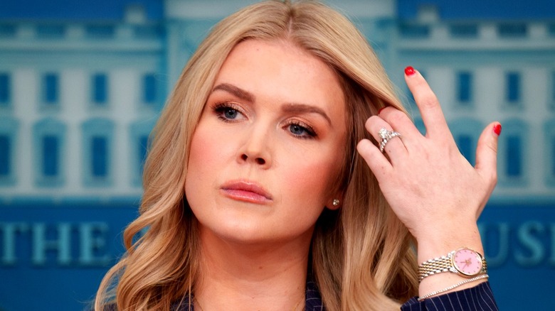 Closeup of Karoline Leavitt giving a press briefing at The White House.