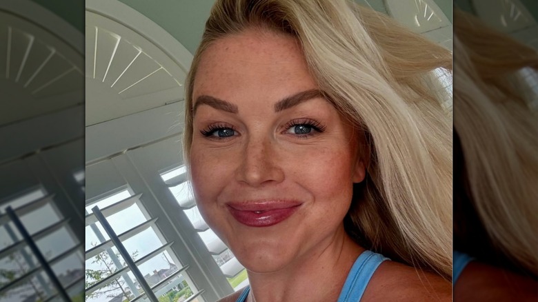 Karoline Leavitt wearing a blue tank top