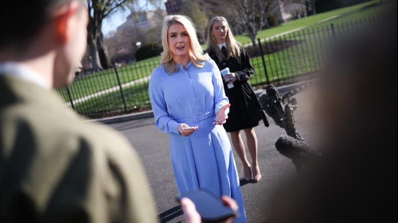 Karoline Leavitt wearing a matronly blue outfit