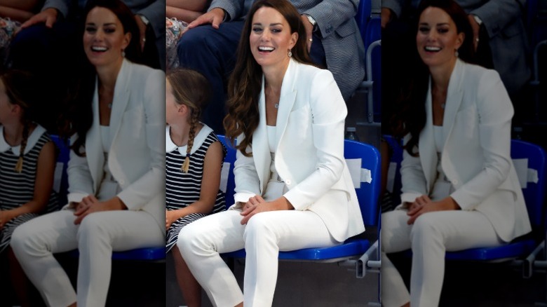 Princesses Charlotte and Catherine watch a swimming competition