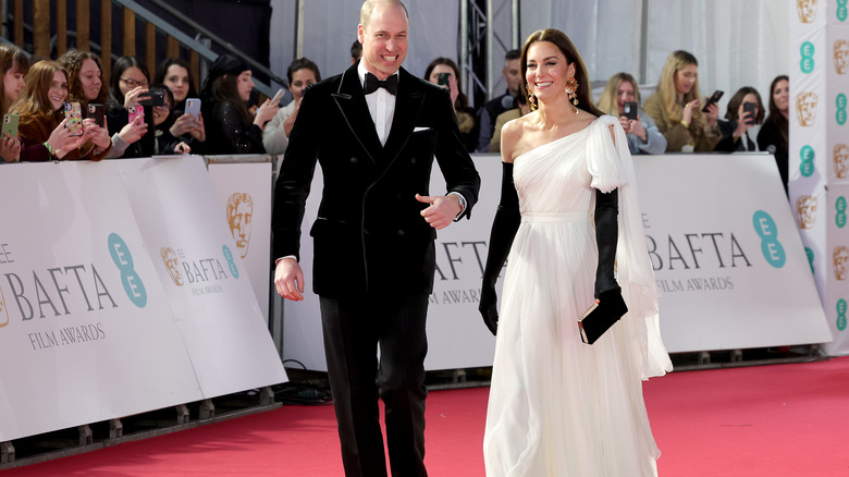 Kate Middleton smiling on red carpet