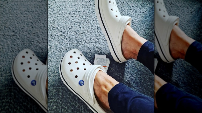 Person sporting trendy white Crocs