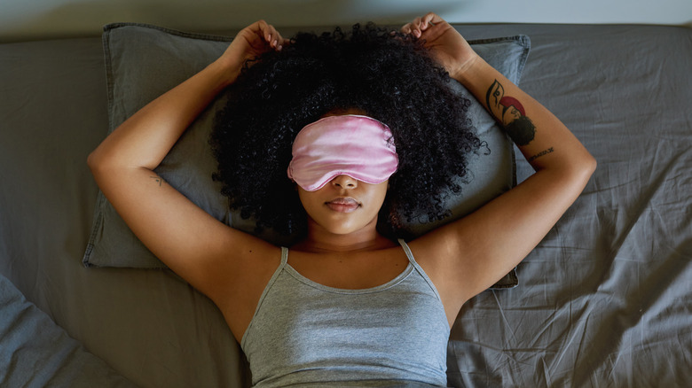 woman sleeping with eye mask