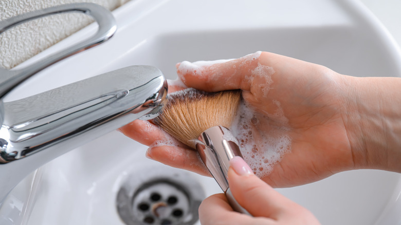 Washing a makeup brush